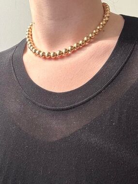 Small gold toned ball beaded necklace